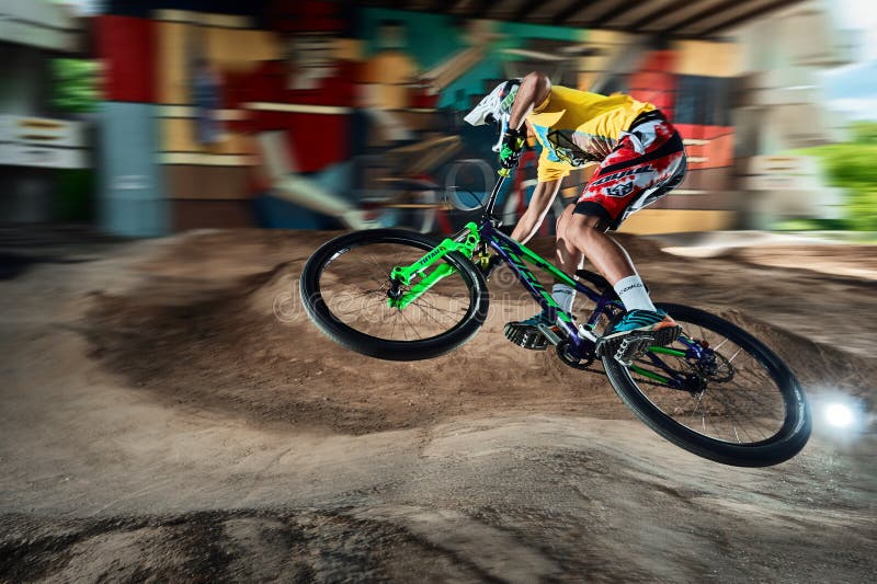 Jump and fly on a mountain bike on a pump track royalty free stock image Jump and fly on a mountain bike on a pump track royalty free stock image