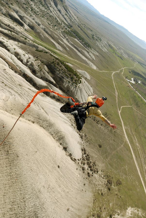 Jump Off a Cliff with a Rope.Bungee Jumping Stock Photo Image of