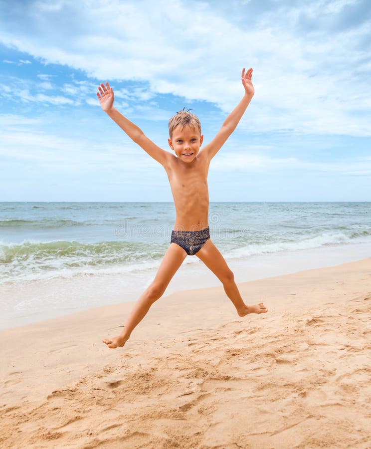 Jumping boy on the beach