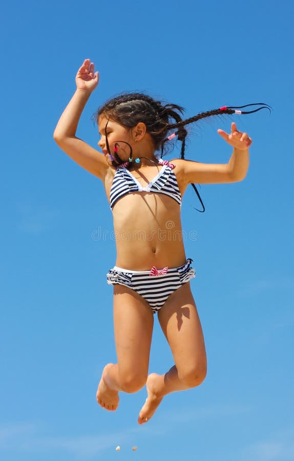 Jumping Girl Against the Blue Sky Stock Photo - Image of jump
