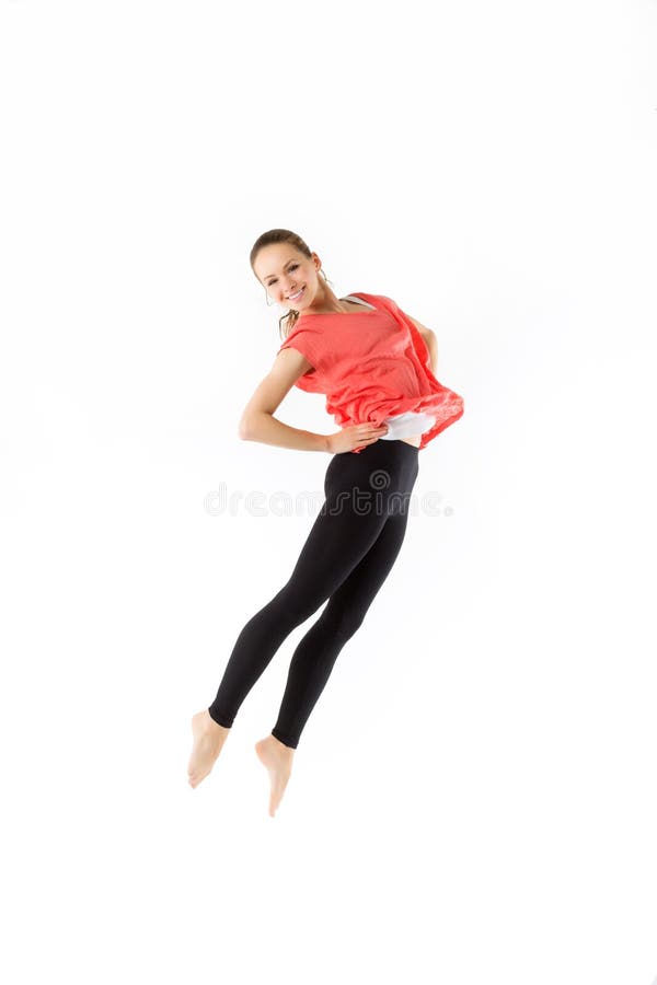 Jumping happy young woman, isolated on white