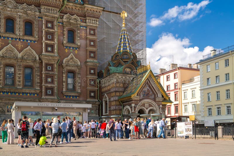 June 24, 2023 Russia, St. Petersburg, Church of the Savior on Spilled Blood, a queue of tourists for tickets. Horizontal photo. June 24, 2023 Russia, St. Petersburg, Church of the Savior on Spilled Blood, a queue of tourists for tickets. Horizontal photo