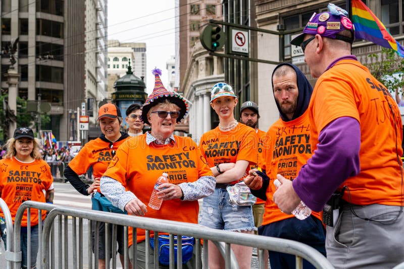 June 30, 2019 San Francisco / CA / USA - A group of people which provide monitoring at the SF Pride Parade on Market Street in royalty free stock photo June 30, 2019 San Francisco / CA / USA - A group of people which provide monitoring at the SF Pride Parade on Market Street in royalty free stock photo