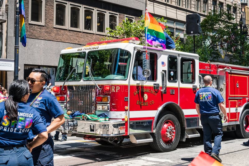 June 30, 2019 San Francisco / CA / USA - San Francisco Fire Department taking part at the SF Pride Parade on Market Street in stock photos June 30, 2019 San Francisco / CA / USA - San Francisco Fire Department taking part at the SF Pride Parade on Market Street in stock photos