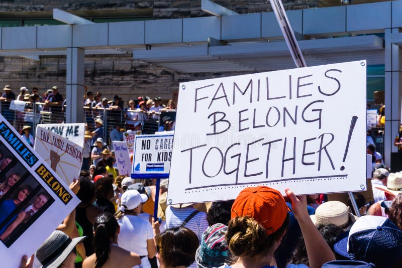 June 30, 2018 San Jose / CA / USA - People gathered in front of the City Hall for the `Families belong together` rally held in downtown San Jose, a sanctuary city in south San Francisco bay area. June 30, 2018 San Jose / CA / USA - People gathered in front of the City Hall for the `Families belong together` rally held in downtown San Jose, a sanctuary city in south San Francisco bay area