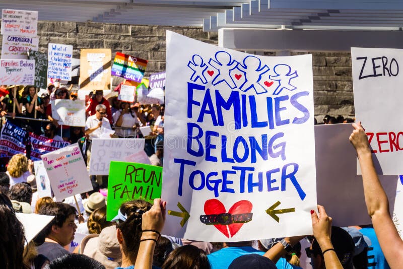 June 30, 2018 San Jose / CA / USA - People gathered in front of the City Hall for the `Families belong together` rally held in downtown San Jose, a sanctuary city in south San Francisco bay area. June 30, 2018 San Jose / CA / USA - People gathered in front of the City Hall for the `Families belong together` rally held in downtown San Jose, a sanctuary city in south San Francisco bay area