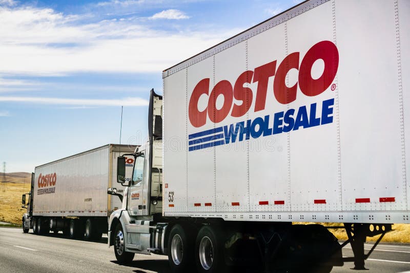 June 28, 2019 Stockton / CA / USA - Branded Costco Wholesale trucks driving on the freeway royalty free stock images June 28, 2019 Stockton / CA / USA - Branded Costco Wholesale trucks driving on the freeway royalty free stock images