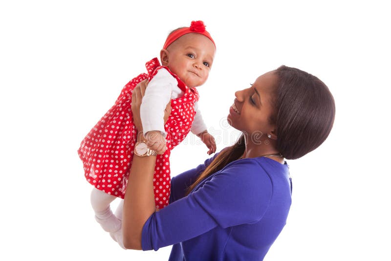 Junge Afroamerikanermutter, die mit ihrem Baby spielt lizenzfreies stockbild Junge Afroamerikanermutter, die mit ihrem Baby spielt lizenzfreies stockbild