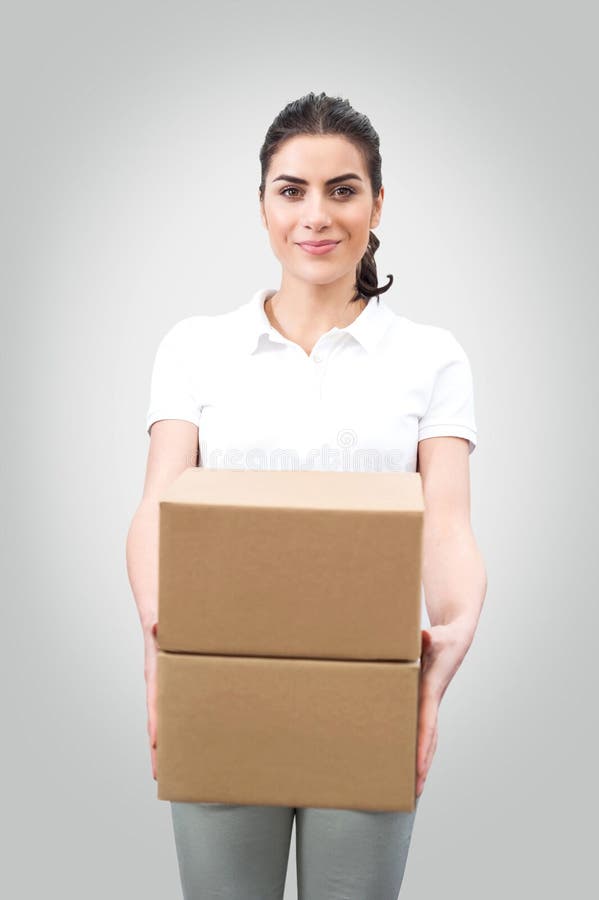 Junge Arbeitnehmerin, die Kästen hält stockbilder Junge Arbeitnehmerin, die Kästen hält stockbilder