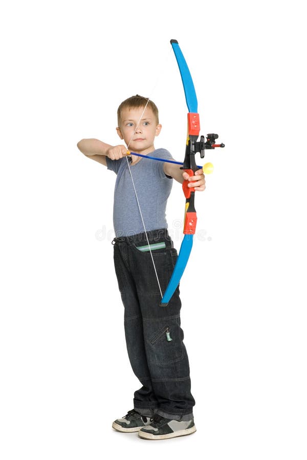 Junge, der einen Bogen schießt stockfotos Junge, der einen Bogen schießt stockfotos