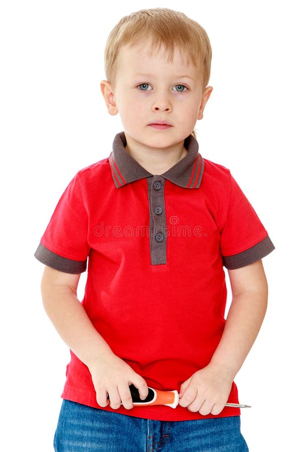 Junge, der einen Schraubenzieher hält stockfoto Junge, der einen Schraubenzieher hält stockfoto