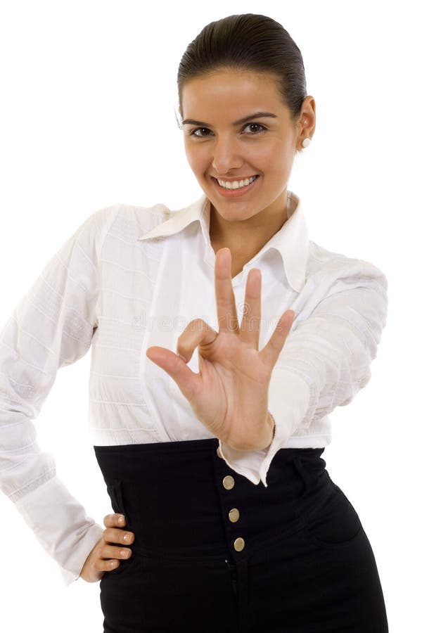 Junge Geschäftsfrau, die okayzeichen anzeigt lizenzfreie stockfotografie Junge Geschäftsfrau, die okayzeichen anzeigt lizenzfreie stockfotografie