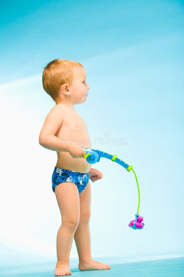 Junge mit Fischereigerät stockbild Junge mit Fischereigerät stockbild