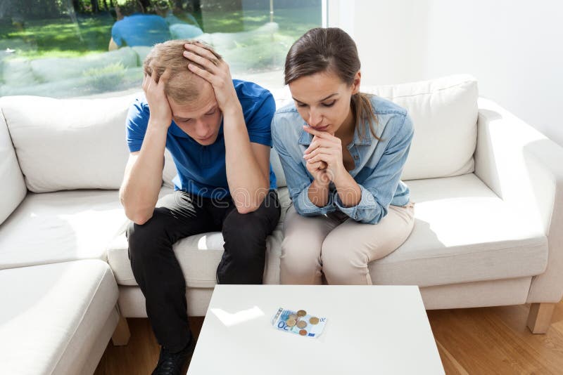 Horizontal view of young couple in bankrupt. Horizontal view of young couple in bankrupt
