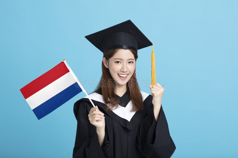 Junge Studentin mit niederländischer Flagge stockfotografie