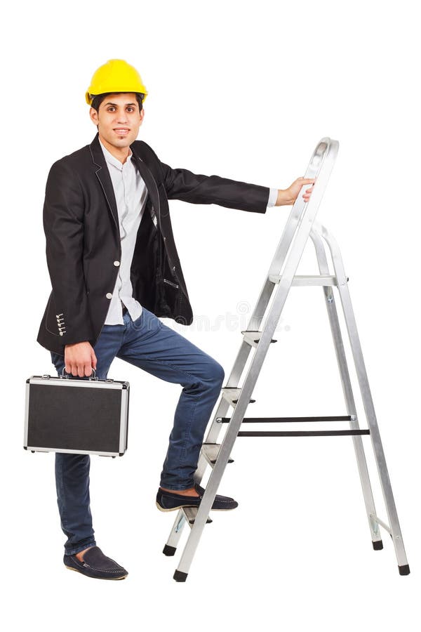 Young worker in a construction helmet with a diplomat in his hand on the white background. Young worker in a construction helmet with a diplomat in his hand on the white background