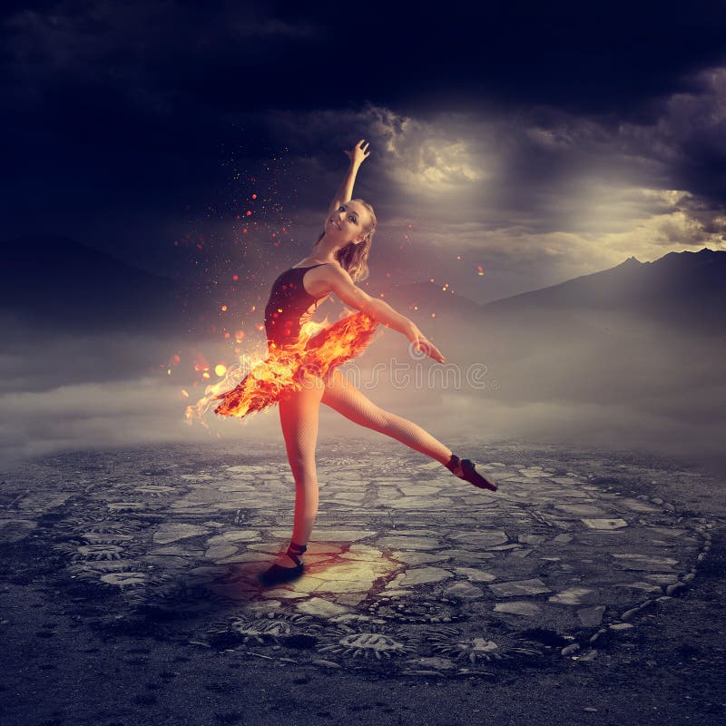 Junger Balletttänzer auf Feuer stockbilder Junger Balletttänzer auf Feuer stockbilder