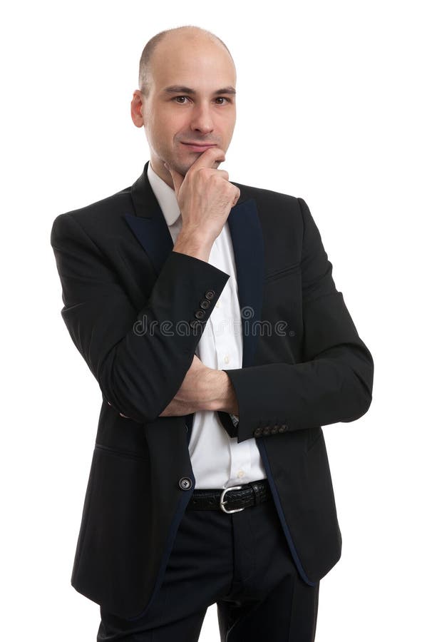 Junger gutaussehender Mann im schwarzen Anzug lizenzfreies stockfoto Junger gutaussehender Mann im schwarzen Anzug lizenzfreies stockfoto