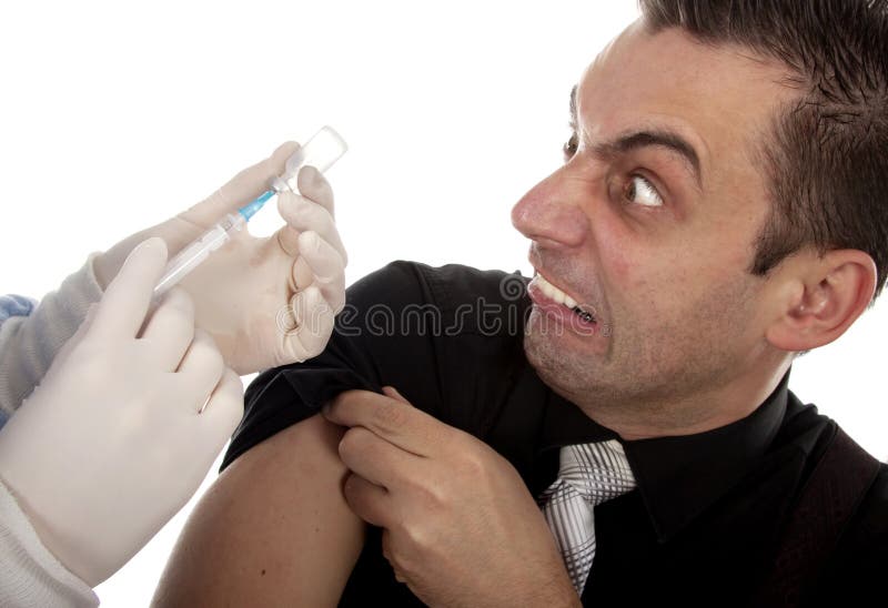 Junger Mann erschrocken von den Einspritzungen stockfoto Junger Mann erschrocken von den Einspritzungen stockfoto