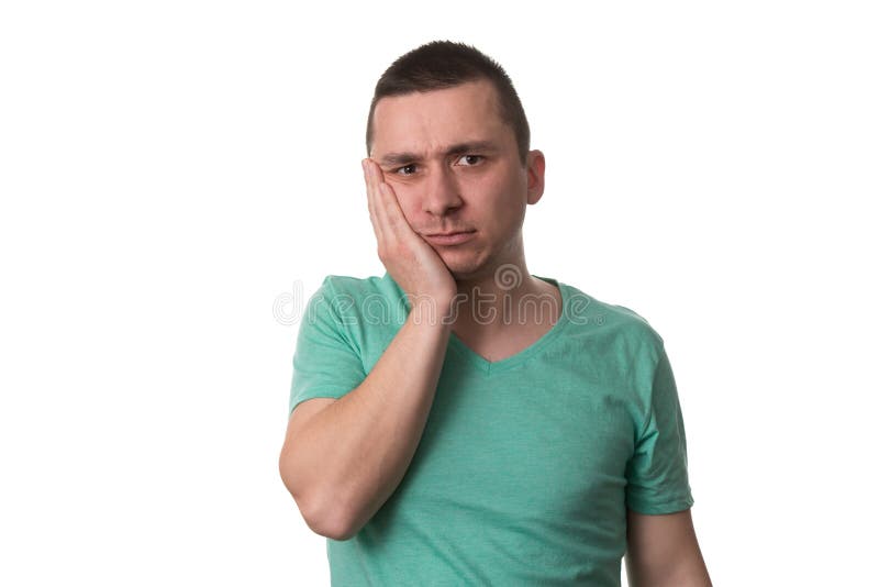 Junger Mann mit einer Zahnschmerzen auf weißem Hintergrund lizenzfreies stockfoto Junger Mann mit einer Zahnschmerzen auf weißem Hintergrund lizenzfreies stockfoto
