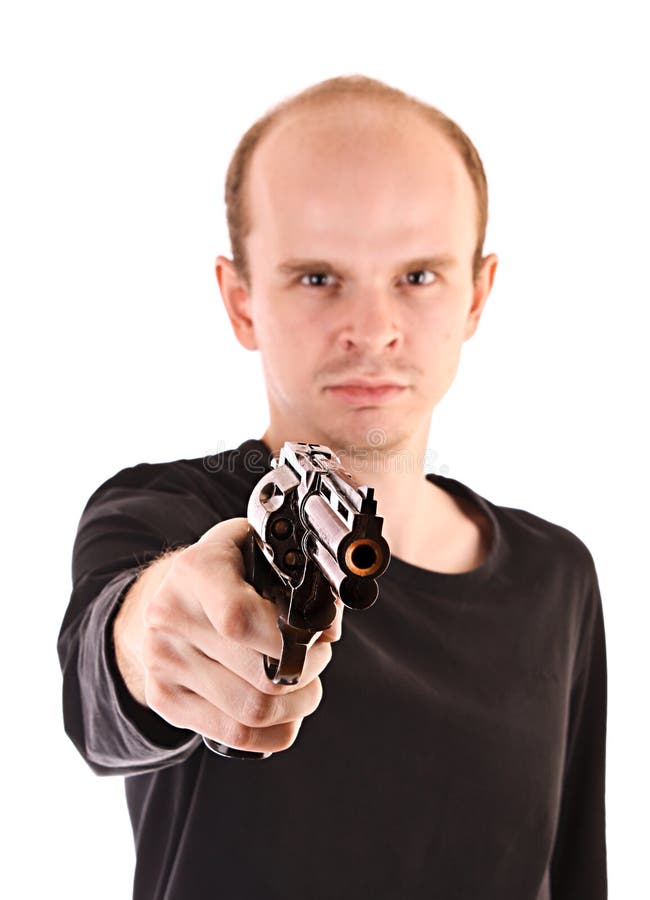 Junger verärgerter Mann, der mit Gewehr zielt lizenzfreie stockfotografie Junger verärgerter Mann, der mit Gewehr zielt lizenzfreie stockfotografie