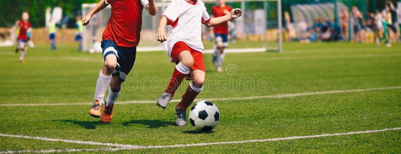Junior Soccer Match. Football Game For Youth Players stock photos Junior Soccer Match. Football Game For Youth Players stock photos