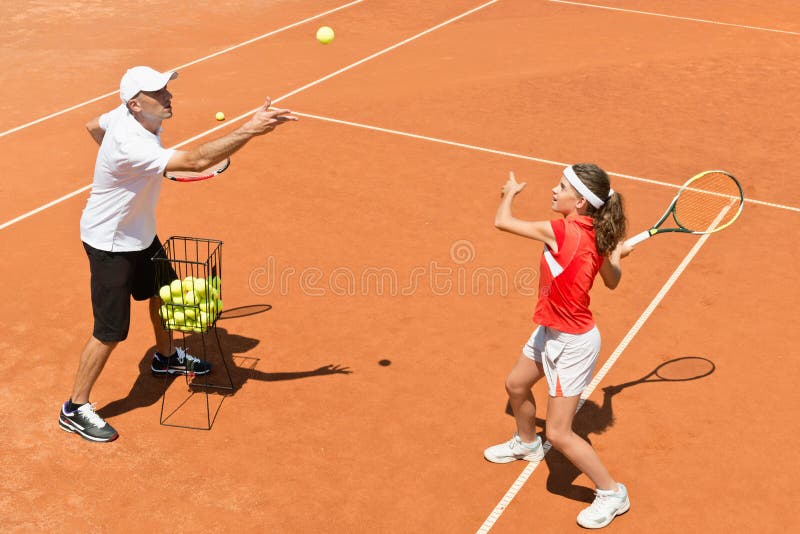 Junior Tennis Player in Training Stock Image Image of exercising, orange 221374931