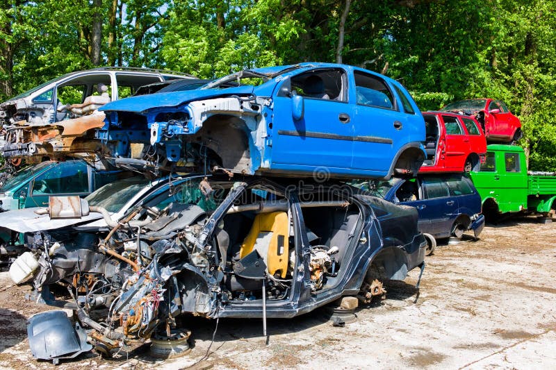 Junk cars in a junkyard royalty free stock photography