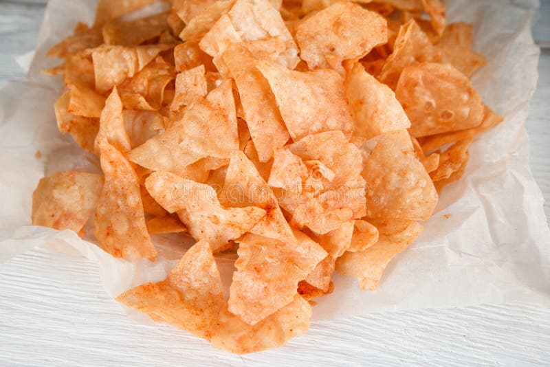 Junk food, unhealthy eating. Potato chips, closeup