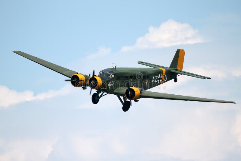 Commemorating 100 years of the first flight school in Italy, La Comina, near Pordenone. Flight demonstration of historic aircraft. JUNKERS JU 52; it was a three-engine, cargo and passengers, produced by German Junkers beginning of the thirties and used as the first civilian aircraft and later as a transport and bomber, primarily from the Luftwaffe. Commemorating 100 years of the first flight school in Italy, La Comina, near Pordenone. Flight demonstration of historic aircraft. JUNKERS JU 52; it was a three-engine, cargo and passengers, produced by German Junkers beginning of the thirties and used as the first civilian aircraft and later as a transport and bomber, primarily from the Luftwaffe.