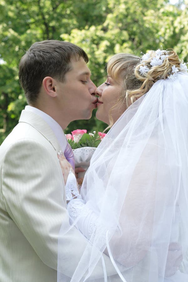 Just married couple kissing