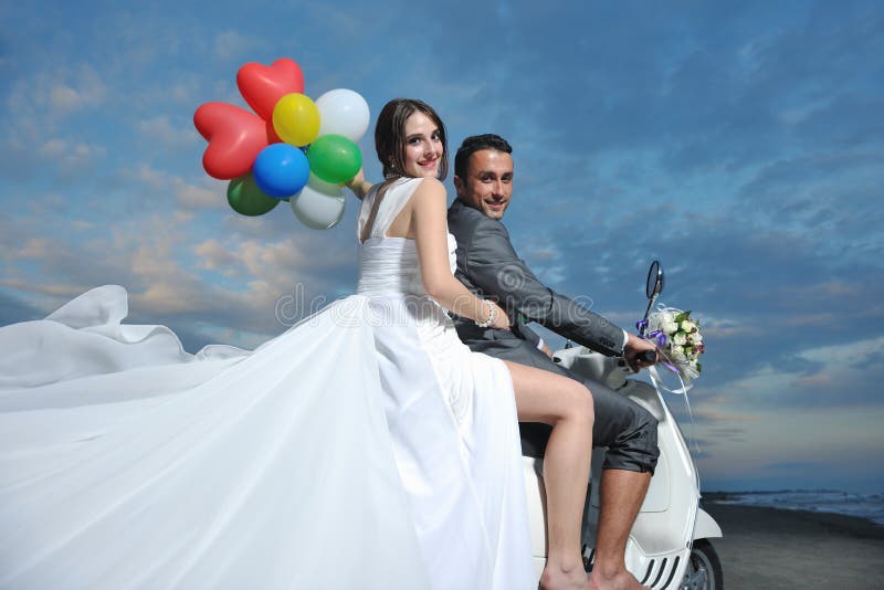 Just Married Couple Ride White Scooter Stock Pho