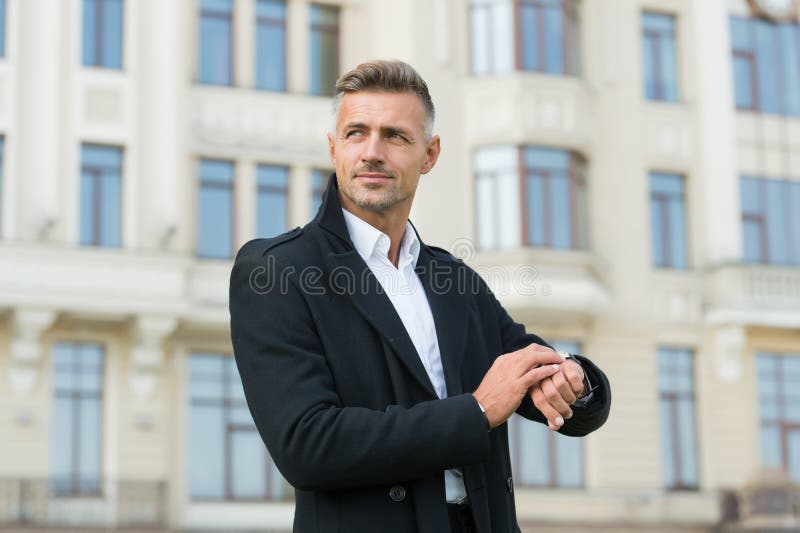 Just in time. Handsome man wear luxurious watch urban background defocused. Symbol of success. Business people concept