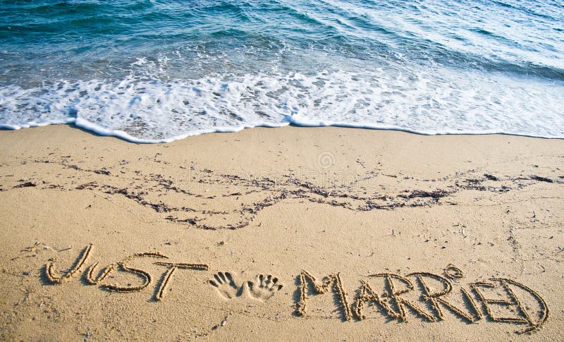 Just Married written in the Sand on the Beach. Just Married written in the Sand on the Beach