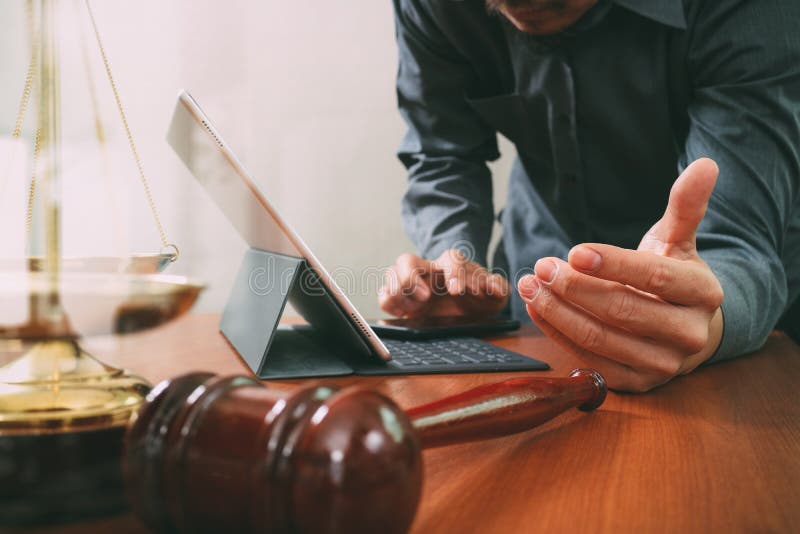 justice and law concept.Male lawyer in office with the gavel,wor