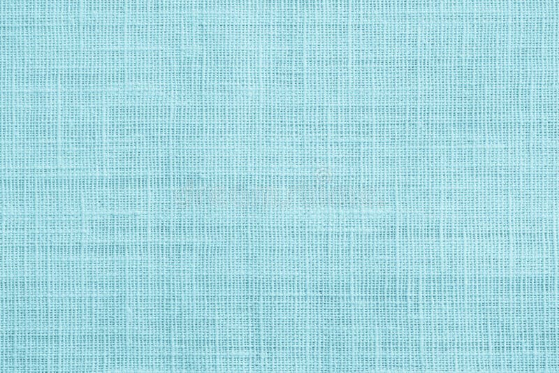 Jute hessian sackcloth canvas sack cloth woven texture pattern background in teal cyan blue color stock image