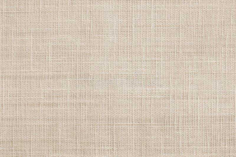 Jute hessian sackcloth canvas woven texture pattern background in light beige cream brown color stock photos