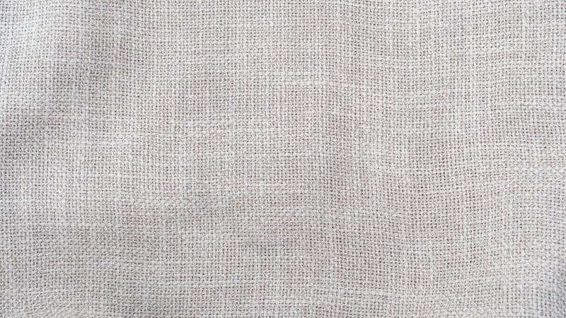 Jute hessian sackcloth woven burlap texture background in sepia cream old aged brown color royalty free stock images