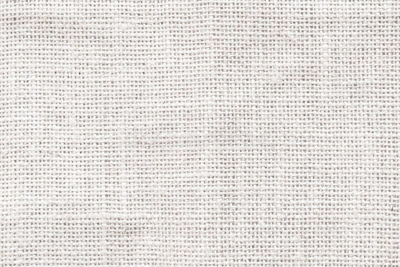 Jute hessian white sackcloth woven burlap texture pattern background in old aged light grey color royalty free stock photo