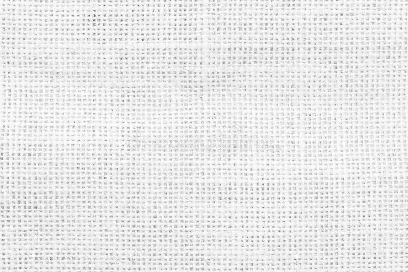 Jute hessian white sackcloth woven burlap texture pattern background in old aged light grey color.