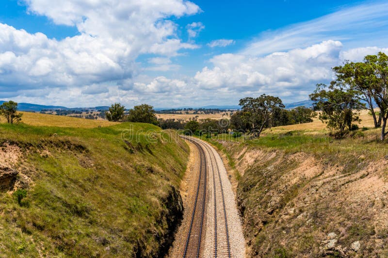 Järnvägsspår i vildmark Australien royaltyfri fotografi Järnvägsspår i vildmark Australien royaltyfri fotografi