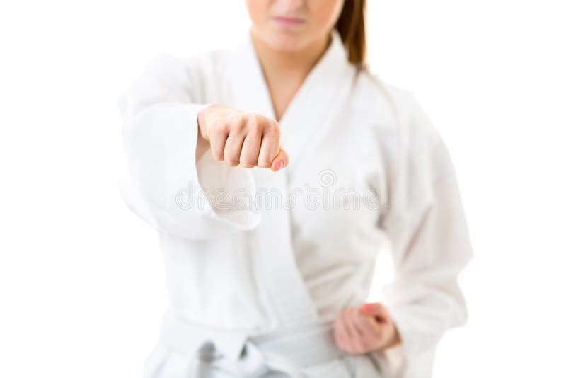 jóvenes, mujer que realiza movimientos del karate fotografía de archivo libre de regalías jóvenes, mujer que realiza movimientos del karate fotografía de archivo libre de regalías