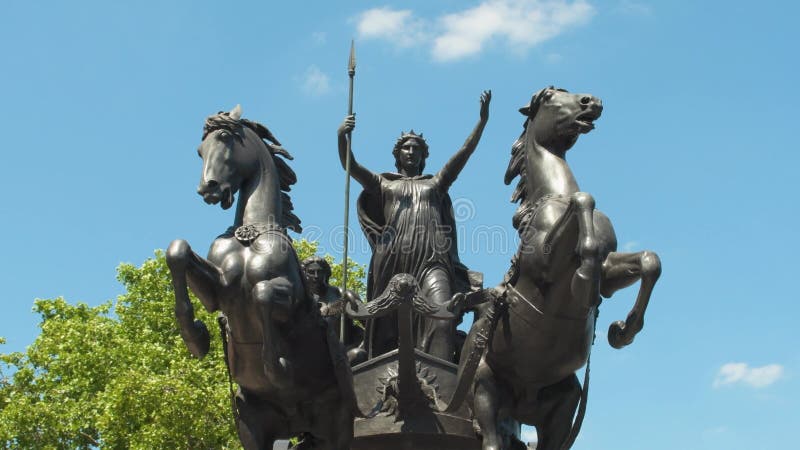 4k footage of the statue Boadicea and Her Daughters in Westminster, London, England, depicting queen Boudicca holding a spear