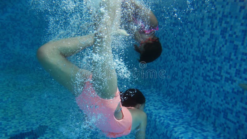 4k Video of Two Teenage Girls Diving Underwater at Indoor Swimming Pool. Children Having Fun and Enjoying Water Stock Footage - Video of face, dive: 146803738