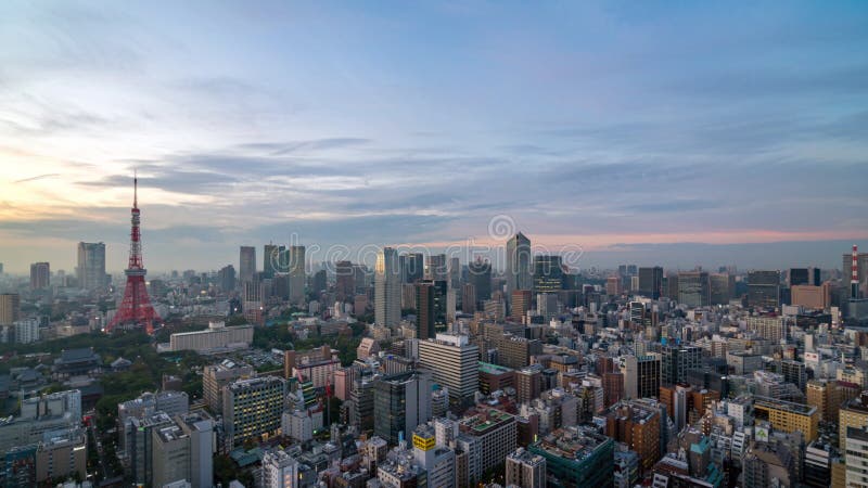 4K UHD Zeit Laptop Tag zu Nacht von Tokio City Skyline-Ansicht und Gebäude in Japan mit Sonnenuntergang und farbenfrohe Skyline S