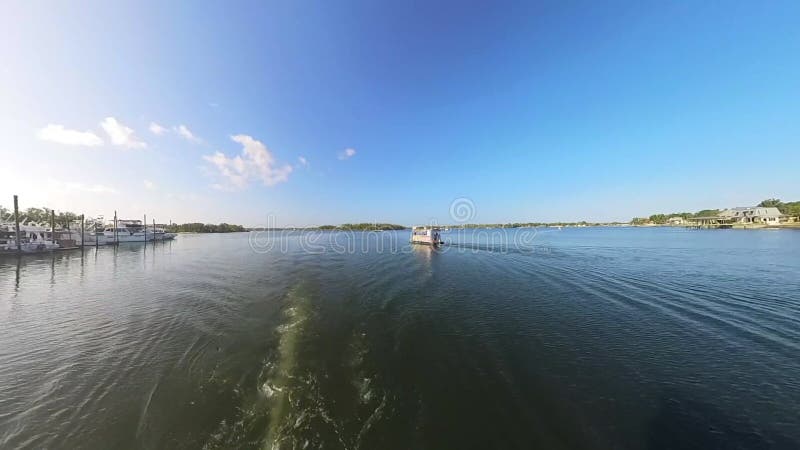 4K video of a small boat at Crystal River, Florida stock video footage