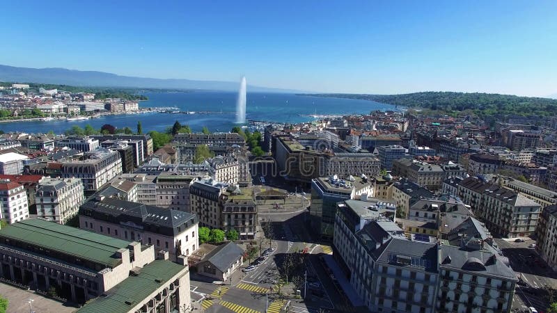 4K εναέριο μήκος σε πόδηα της πηγής νερού πόλεων της Γενεύης στην Ελβετία - UHD