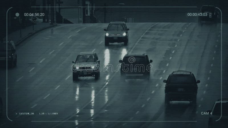 Kabeltelevisie-Auto's op Regenachtige Dag in Stad