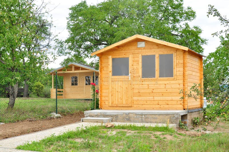 Wooden cabin or chalet, garden house, country property. Wooden cabin or chalet, garden house, country property.
