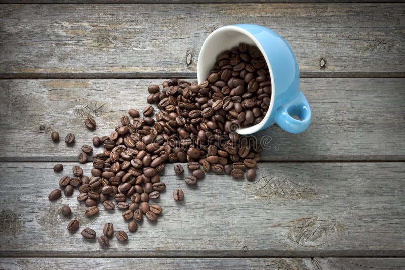 Kaffeebohnen höhlen Hintergrund lizenzfreies stockfoto Kaffeebohnen höhlen Hintergrund lizenzfreies stockfoto